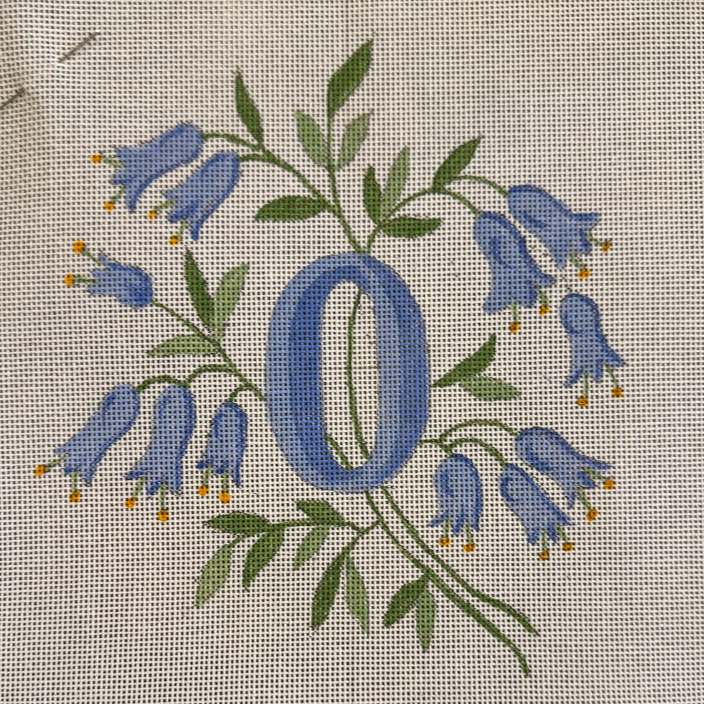 INITIALS IN BLUE BELL-SHAPED FLOWERS