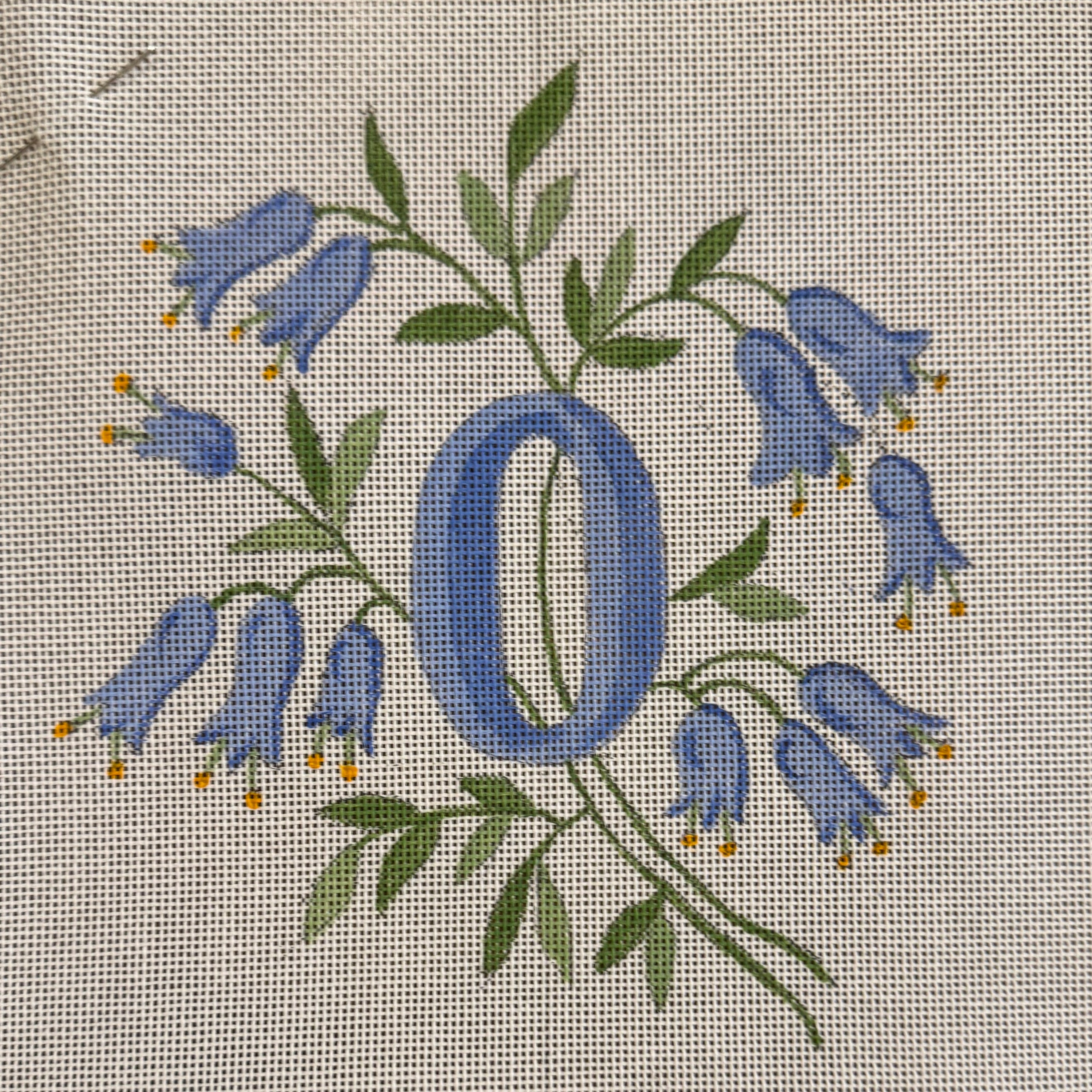 INITIALS IN BLUE BELL-SHAPED FLOWERS